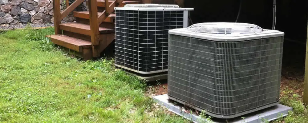 Heat pump installation and service units outside a home in Bakersfield, CA